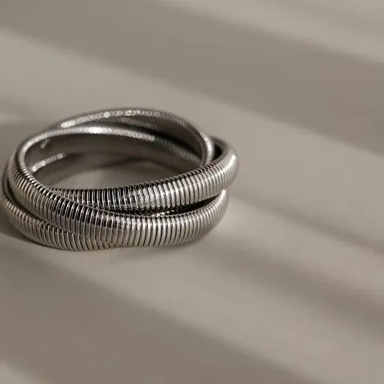 Caitlyn Minimalist Ribbed Triple Infinity Interlocked Bangle Bracelet in White Gold