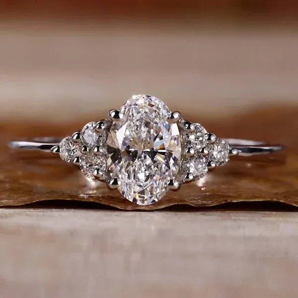 0.50 CT Oval Cut Lab Grown Diamond Muse Engagement Ring