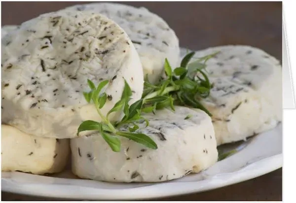 French goat cheese - chevre - with herbs on a