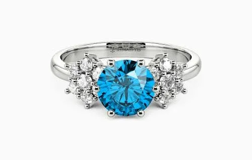 "The Whisper Of Snows" Round Cut Side Stone Engagement Ring