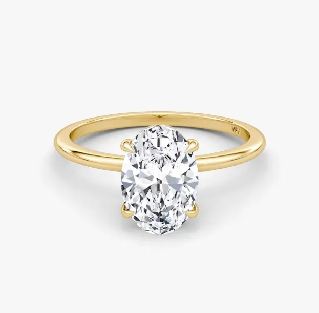 The Petite 4-Prong Solitaire Oval Engagement Ring