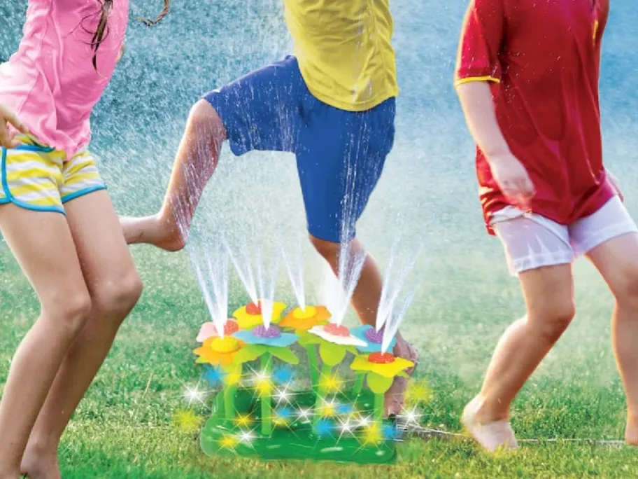 Ja-Ru Light Up Flower Patch Water Sprinkler Activity